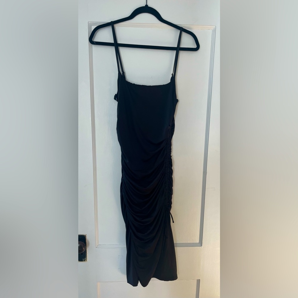 Princess Polly Black Body Con Dress with ties in the side. Size US 8.